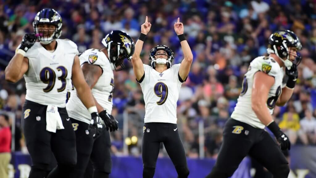 Baltimore Ravens kicker Justin Tucker reacts after a field goal in the first quarter against the Green Bay Packers