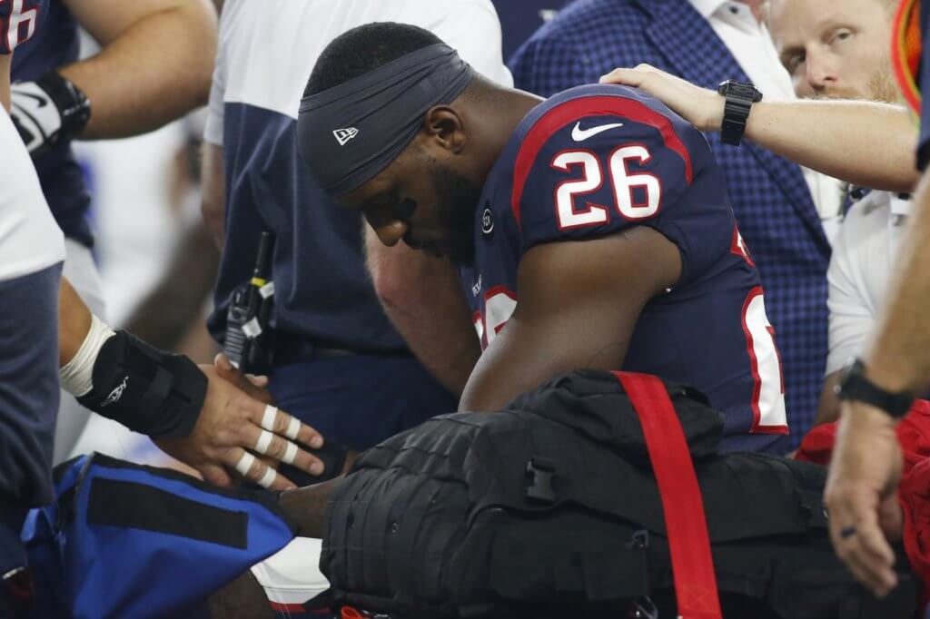 Lamar Miller carted off the field due to injury.