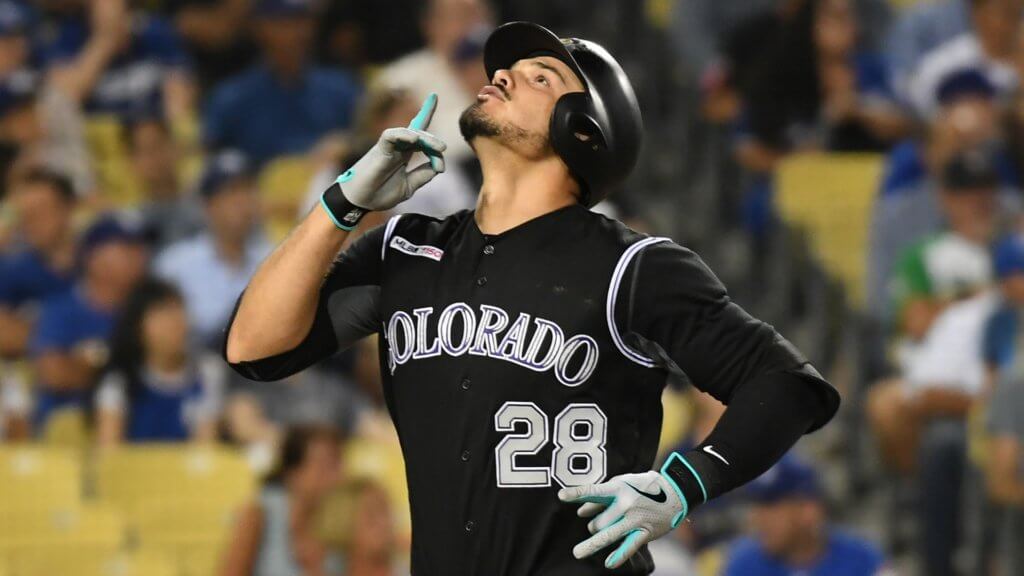 Nolan Arenado reacts after hitting a home run against the Los Angeles Dodgers. He's now one of only four third baseman in MLB history with at least three 40-HR campaigns on their resume -- joining Hall of Famers Mike Schmidt and Eddie Mathews, as well as fellow Rockie Vinny Castilla, in a very exclusive club | MLB Weekly Preview
