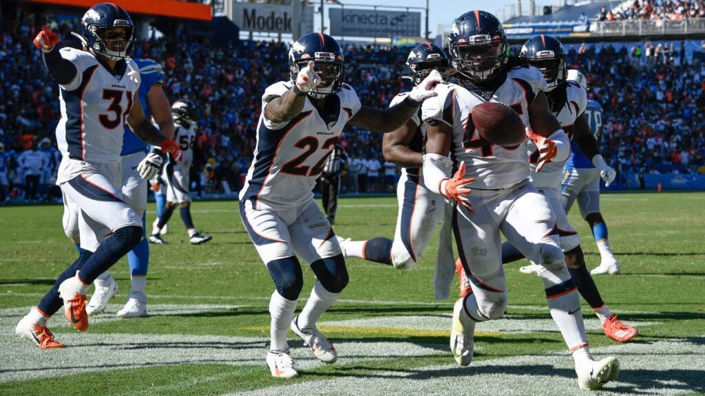 Denver Broncos linebacker A.J. Johnson (45) celebrates intercepting a Los Angeles Chargers quarterback Philip Rivers (not pictured) pass in the end zone with teamates free safety Justin Simmons (31) and defensive back Kareem Jackson (22) at Dignity Health Sports Park | IDP Waiver Wire