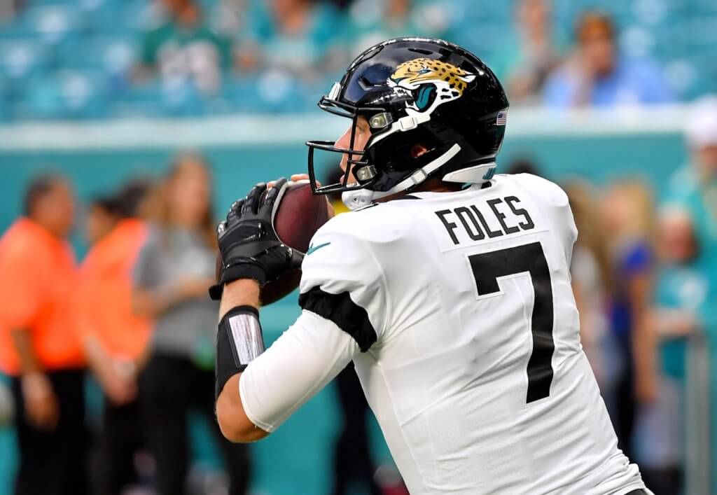 Nick Foles warms up before a game.