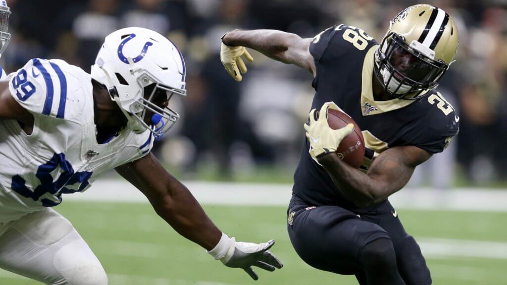 IDP Waiver Wire | New Orleans Saints running back Latavius Murray (28) is defended by Indianapolis Colts defensive end Justin Houston (99)