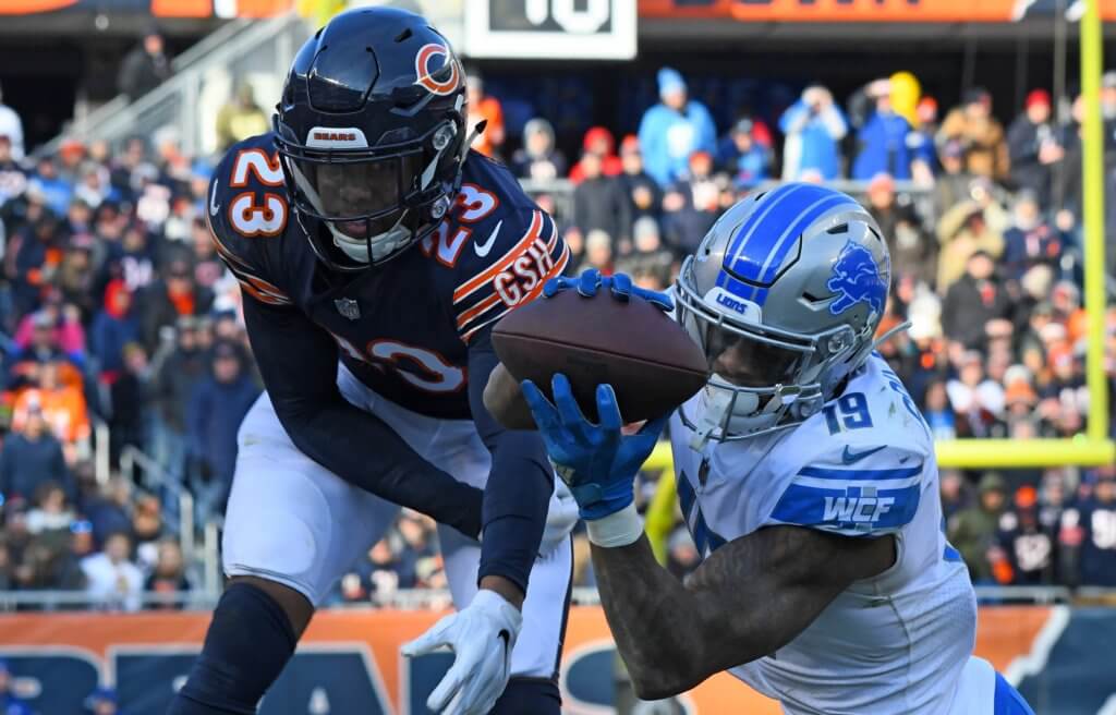 Kenny Golladay completes a catch with Kyle Fuller in coverage