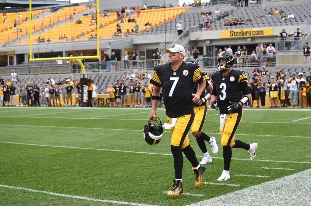Ben running onto the field